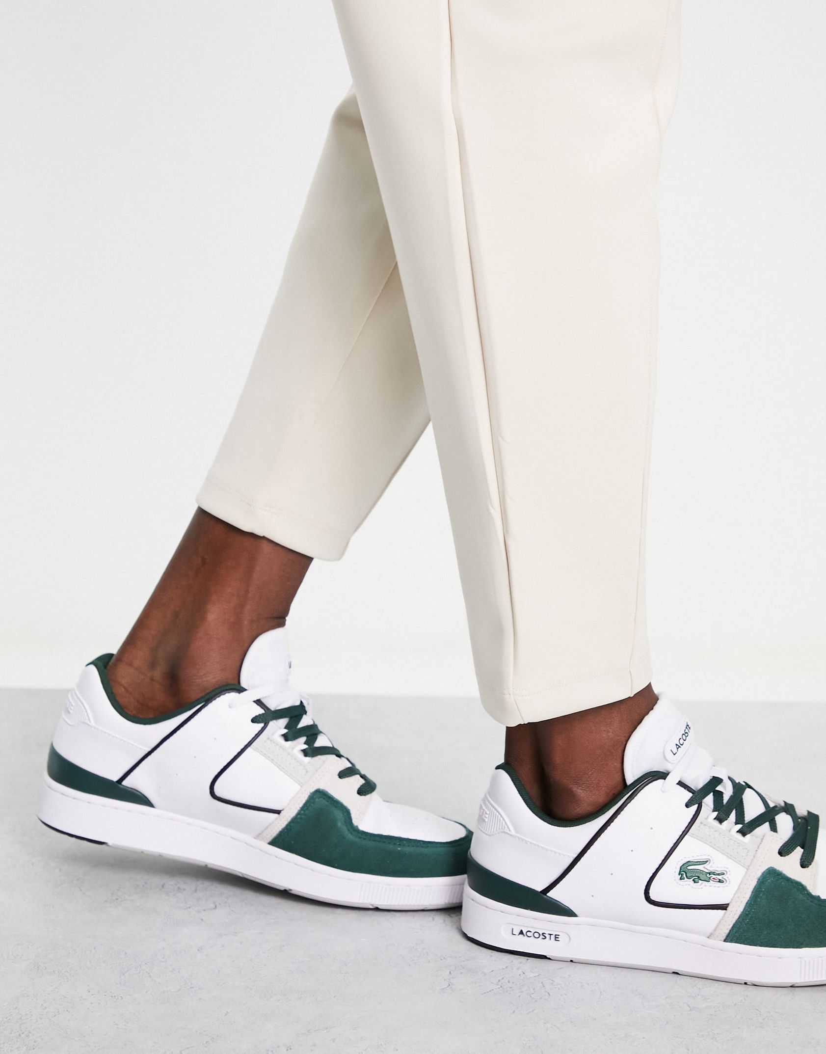 Lacoste court cage chunky trainers in white green  -  Price Checker
