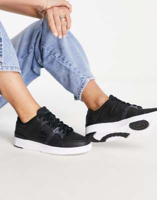 Lacoste Court Cage sneakers in black/white