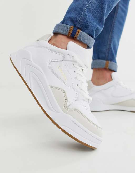 Lacoste Court Slam chunky sneakers with gum sole in white | ASOS