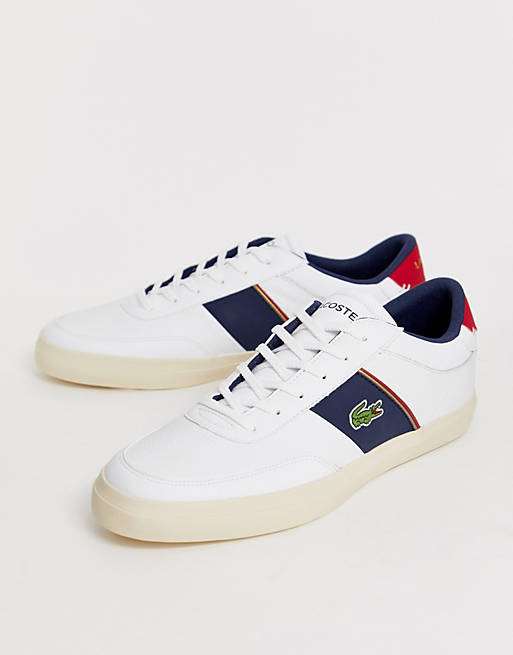 Lacoste Courtmaster trainers with navy side stripe in white leather | ASOS
