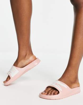 pink lacoste slides
