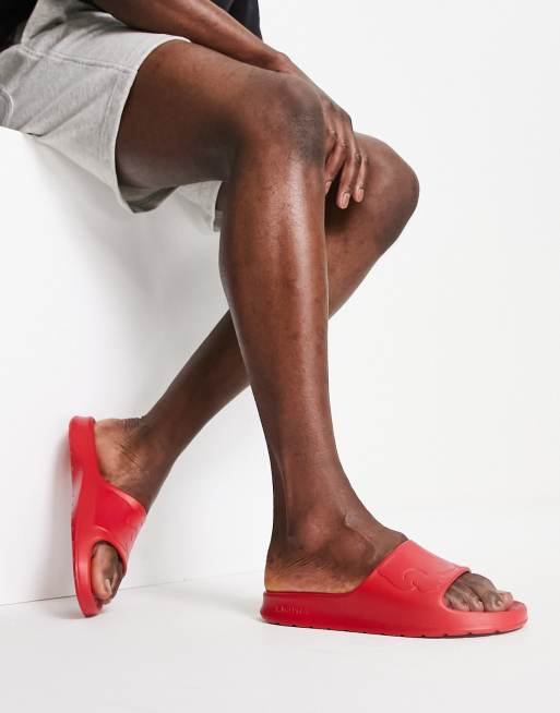 Lacoste – Croco 2.0 – Röda blockfärgade tofflor