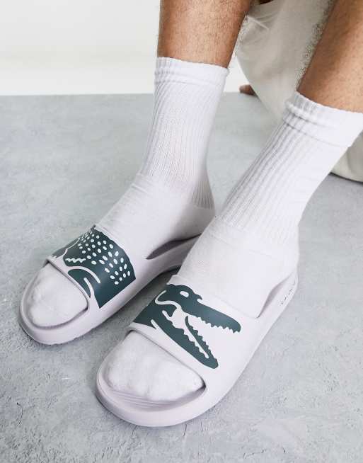 White store lacoste slides