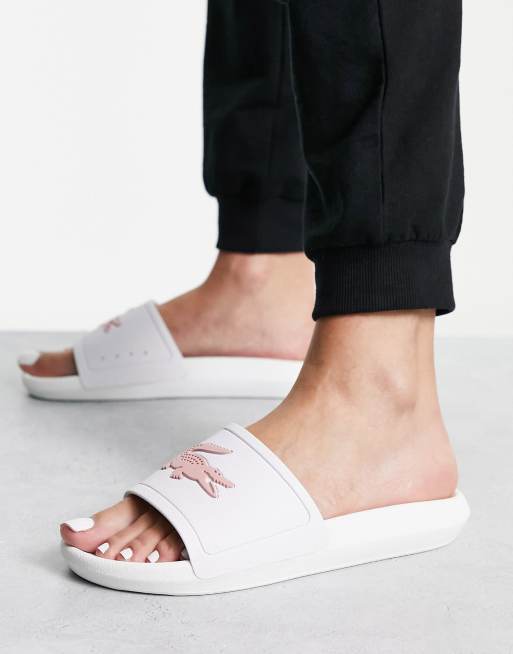 White and pink cheap lacoste sliders