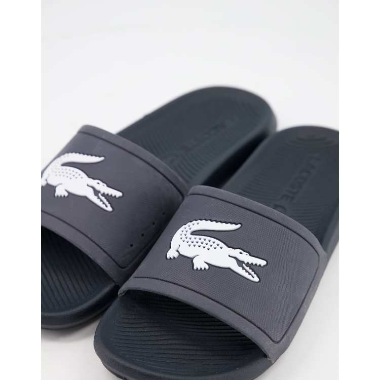 Lacoste Croco sliders in navy ASOS