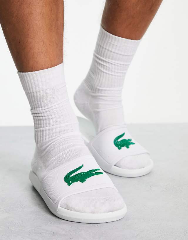 Lacoste croco sliders in white