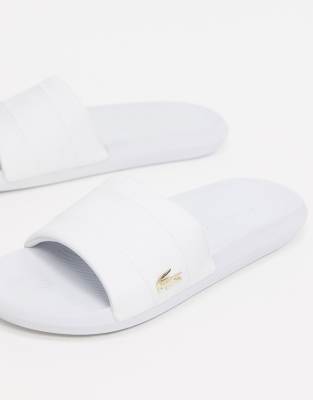 lacoste slides gold