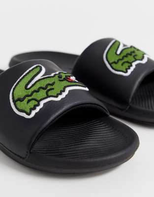 all black lacoste slides