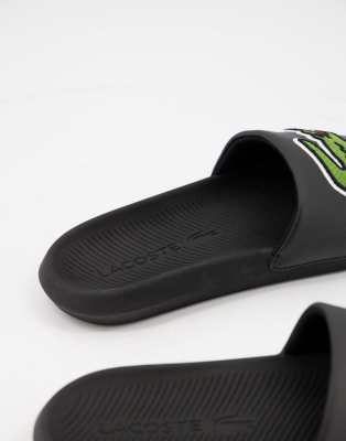 Lacoste Croco slides with large logo in black ASOS