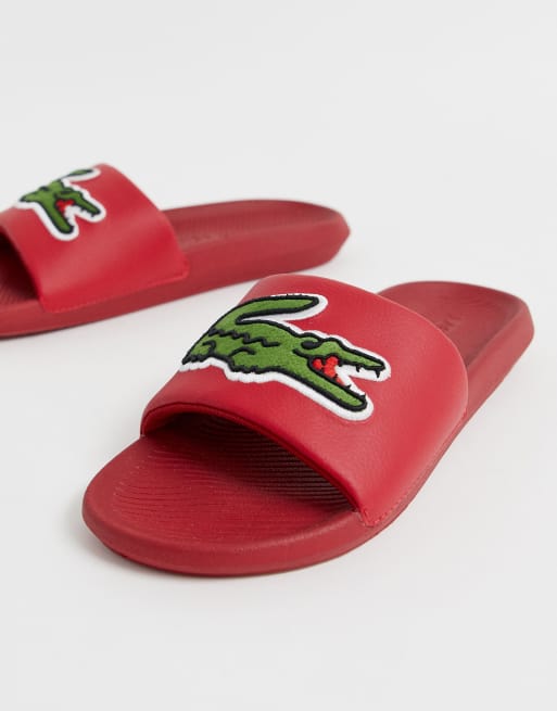 Lacoste Croco slides with large logo in red ASOS