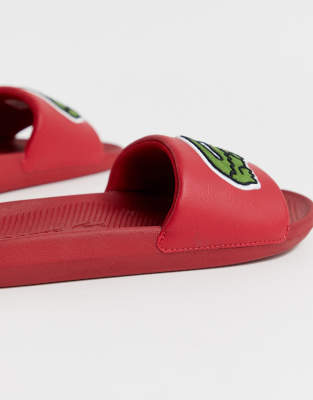 red lacoste slides