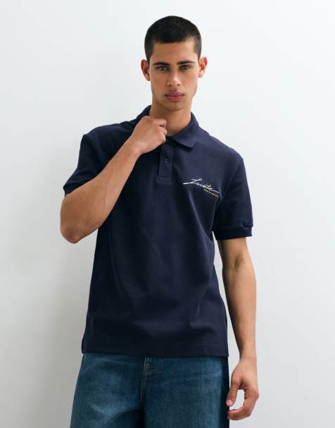 Lacoste embroidered script logo polo shirt in navy