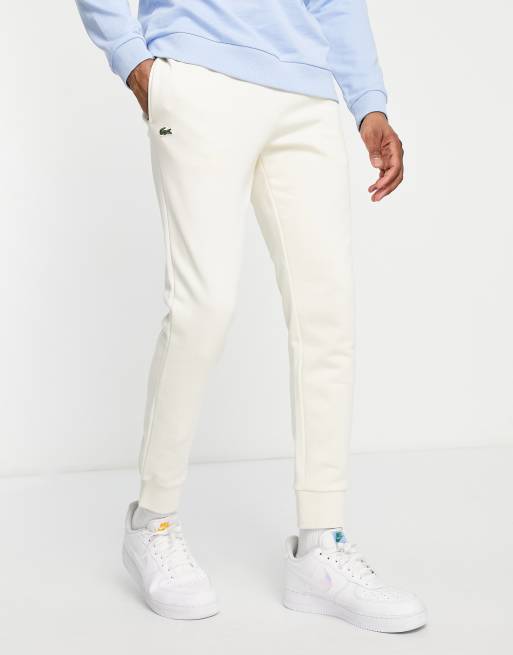 Lacoste fleece joggers in off white