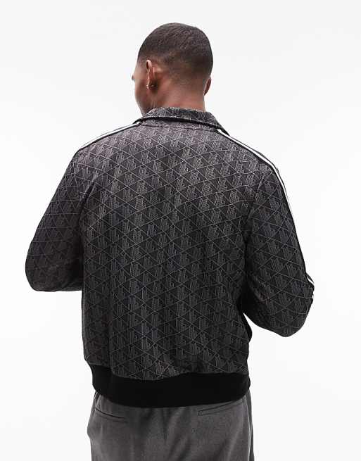 Lacoste full zip through track jacket in black with all over Lacoste full zip through track jacket in black with all over