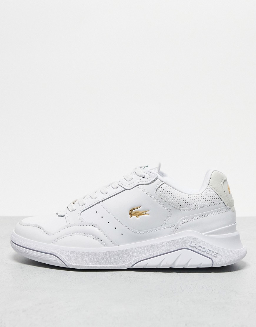 Lacoste Game Advance trainers in white and gold
