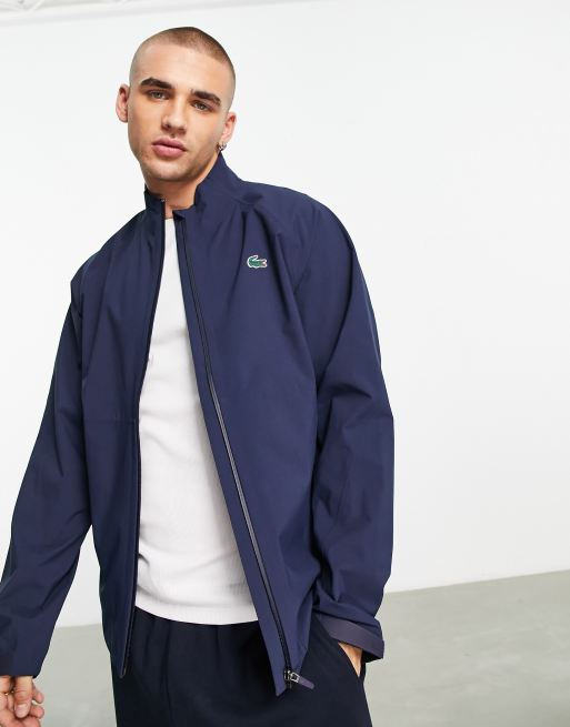 Lacoste Golf high neck zip through jacket in navy