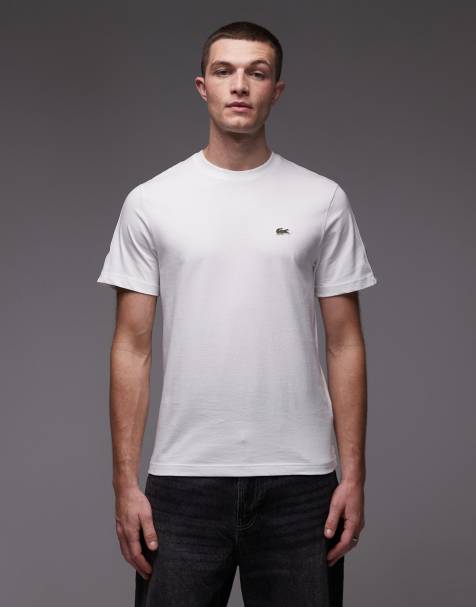 Lacoste – Gräddvit t-shirt med tejpad logga - view 1