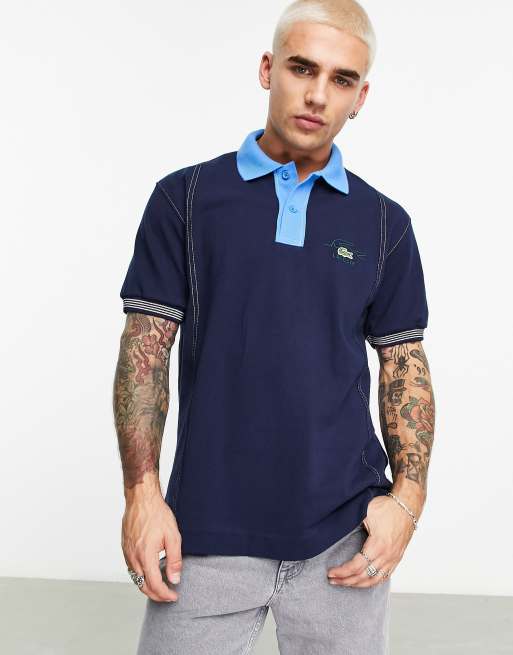 Lacoste – Granatowa koszulka polo o klasycznym kroju z kontrastową lamówką