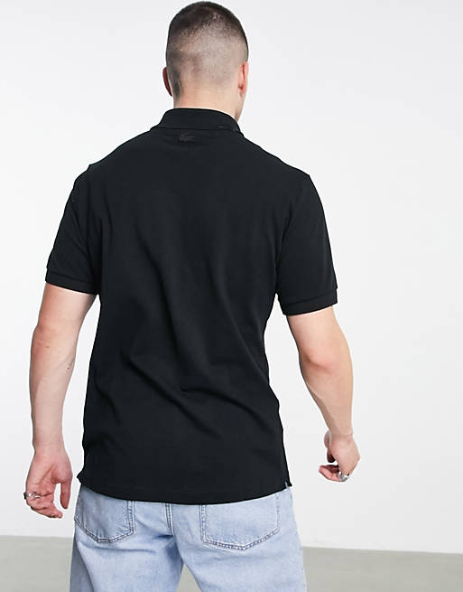  Lacoste graphic text logo polo in black 