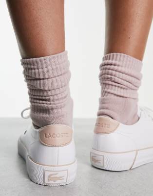 Lacoste Gripshot sneakers in white/pink | ASOS