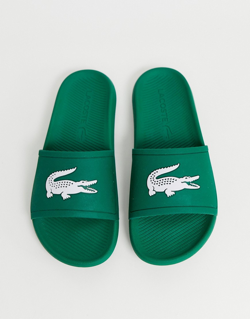 Lacoste – Gröna tofflor med krokodilmotiv