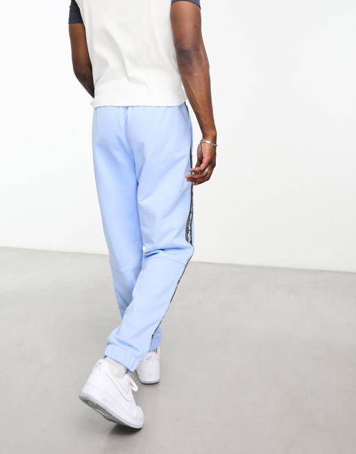 Survetement lacoste bleu hotsell clair