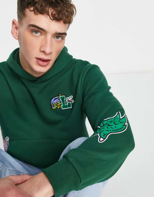 Lacoste – Holiday – Grön huvtröja med märke