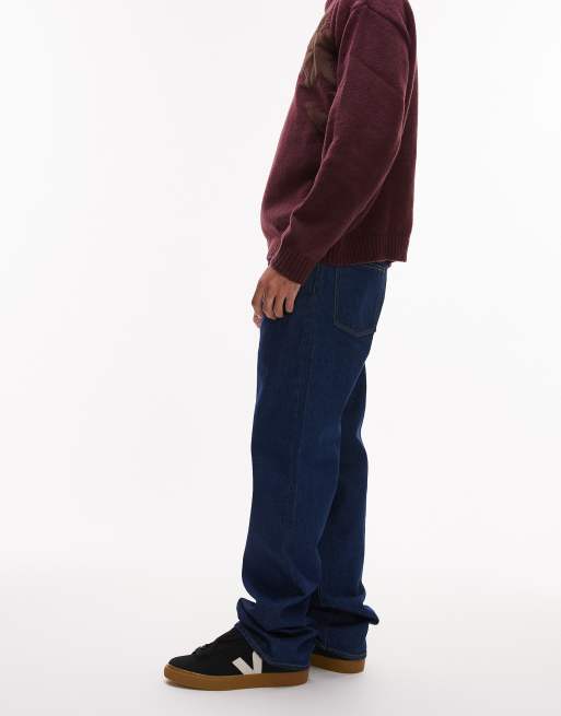 Lacoste – Jeans in dunkler Waschung mit brauner Naht ASOS