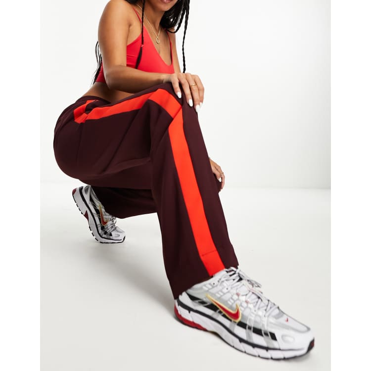 Orange sale lacoste joggers