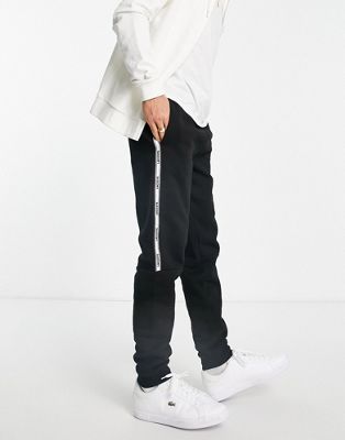 Lacoste joggers with side taping in black