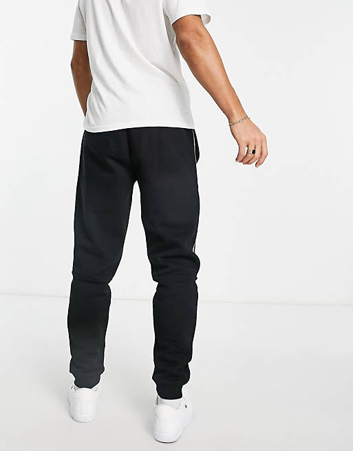  Lacoste joggers with side taping in black 