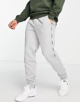 Lacoste joggers with side taping in grey