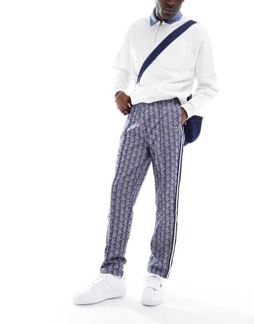Lacoste - Joggingbroek met rechte pijpen en abstracte print en logo in blauw