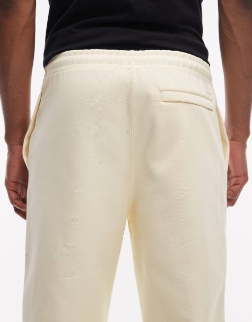 Lacoste – Jogginghose in Gelb mit Logo, 4 von 5