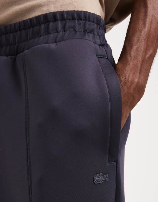 Lacoste – Jogginghose in Marineblau mit weitem Bein, 4 von 5