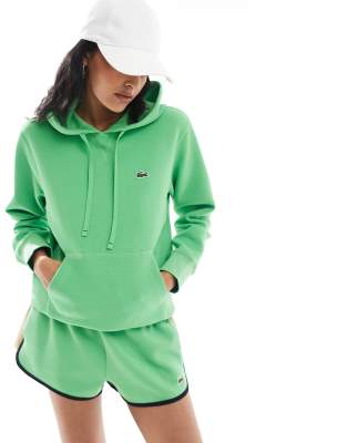 Lacoste - Kapuzenpullover in leuchtendem Grün mit Logo