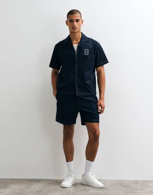 Lacoste kortärmad pikétröja med knappar och logga i navy, 2 av 5