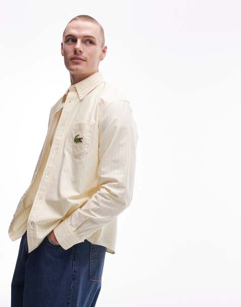 Lacoste – Koszula z długim rękawem w żółto-białe pionowe paski - view 1