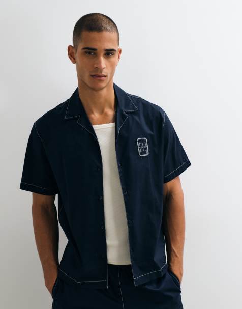 Lacoste koszulka polo z krótkim rękawem, zapinana na guziki, z logo, granatowa - view 1