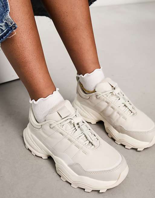 Lacoste L-Guard Breaker CT 2231 sneakers in off white | ASOS Lacoste L-Guard Breaker CT 2231 sneakers in off white | ASOS