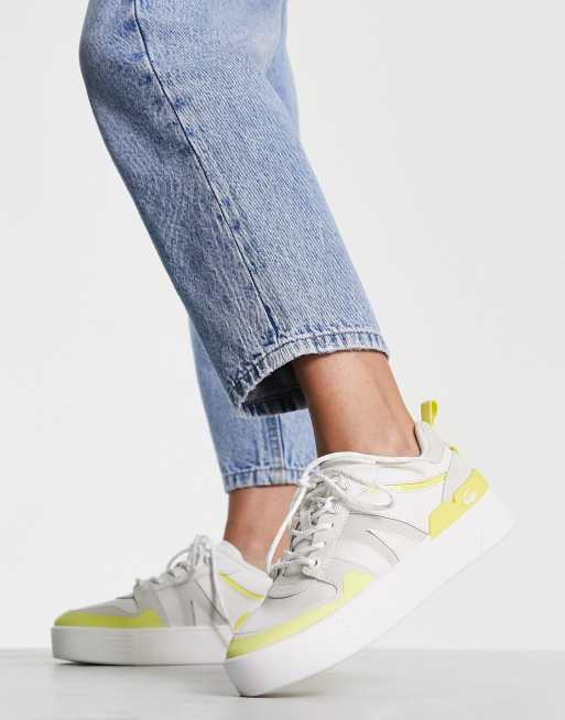 Yellow store white sneakers