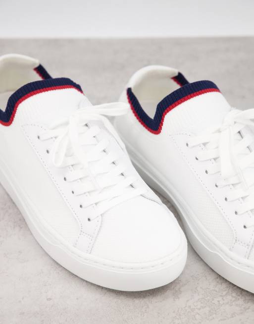 Lacoste La piquee Gebreide sneakers in wit met marineblauw ASOS