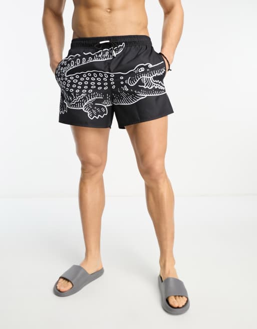 Lacoste large croc swim shorts in black | ASOS