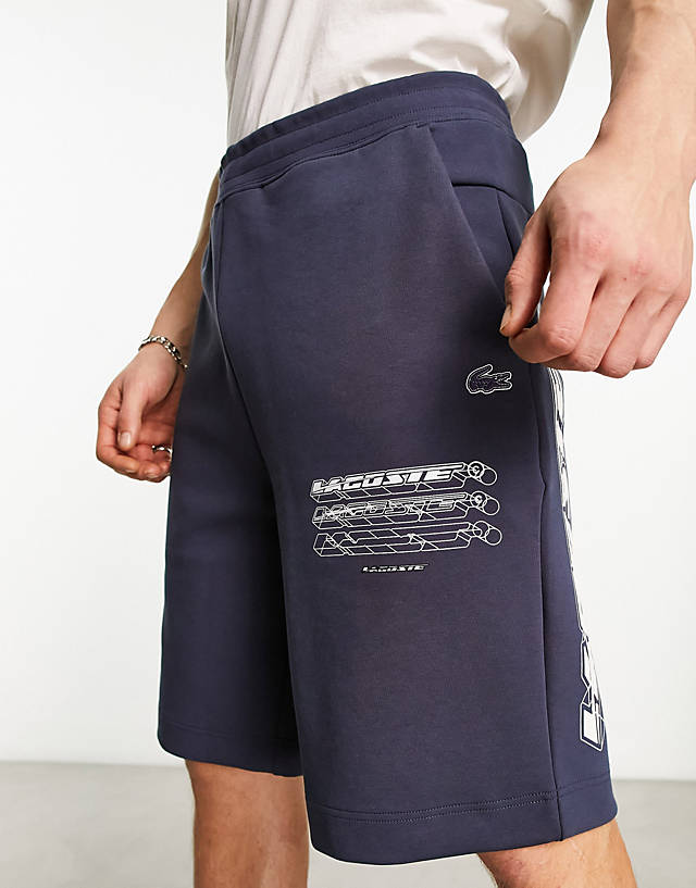 Lacoste - large logo shorts in navy with horizonal branding