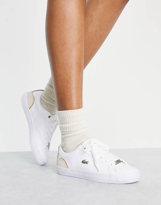 Lacoste Lerond lace up trainers with gold detailing in white leather