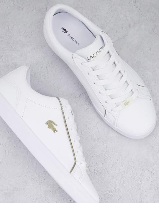 Lacoste Lerond leather sneakers in white and gold