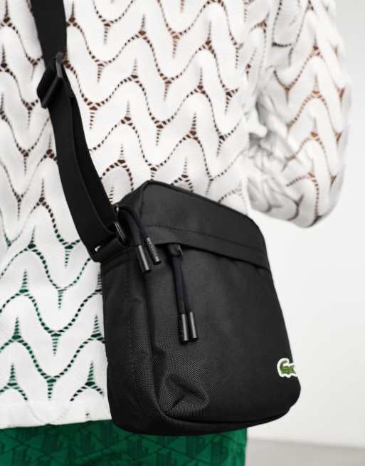 Lacoste logo across body bag in black