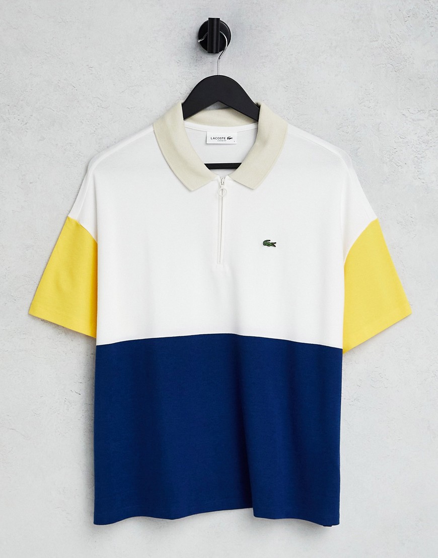 lacoste logo colourblock polo shirt in navy and yellow-pink