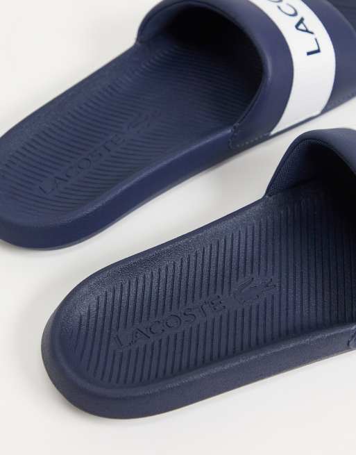 Lacoste best sale navy sliders