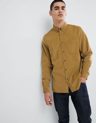 Lacoste logo needle cord shirt in camel 